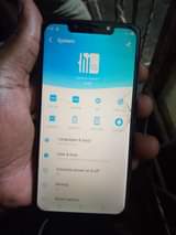 A picture of Tecno spark 3 with some cracks but working well clear