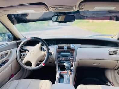 A picture of 2002 MODEL TOYOTA AVALON DASHBOARD NEATLY USED DISTRESS SALE GRADE