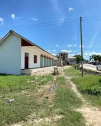 A picture of NYUMBA NA UWANJA MAENEO YA MBWENI BEI MILION 130 PIGA