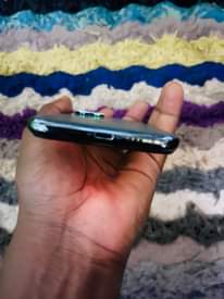 A picture of Iphone 11 pro 256 storage no face 1m 0781627418 or
