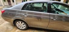 A picture of Clean Toyota Avalon Not keyless Engine gear ac good You