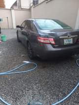 A picture of Toyota camry 2011model 4 months registered tokunbo standard DVD reverse