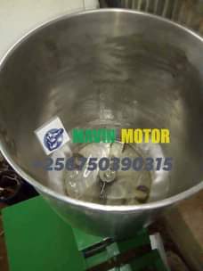 A picture of Stainless G Nut s Grinding Machine of 6kgs per G