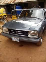 A picture of Very sharp Peugeot 504 with Factory AC built for Nigerian