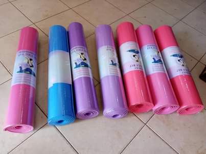 A picture of Gym equipments and dumbbells
