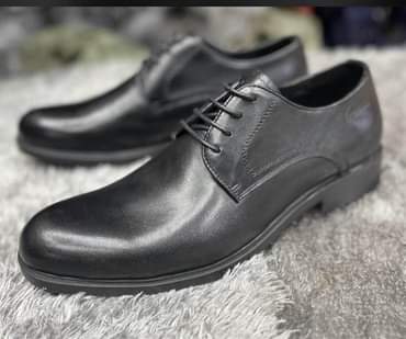 A picture of Mens shoes At affordable prices 160000 Delivery available 256752127281