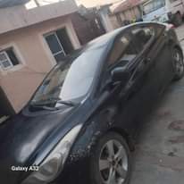 A picture of Cash needed urgently for this 2012 Hyundai Elantra painted once