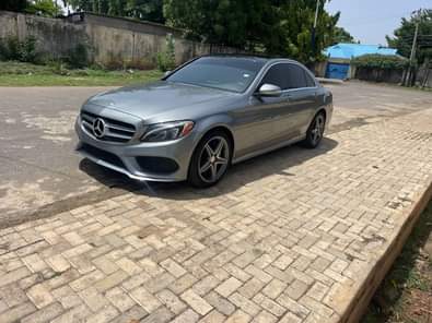 A picture of C400 MERCEDES BENZ FOREIGN USED 2015 MODEL KEYLESS IGNITION WITH