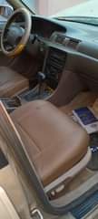 A picture of TOYOTA TINY LIGHT V6 YSED BY WOMAN