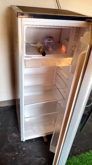 A picture of 220litres fridge with a top freezer