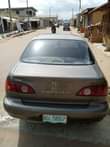 A picture of Toyota Corolla 1999 Okerejuowo lo First body Papers fully complete