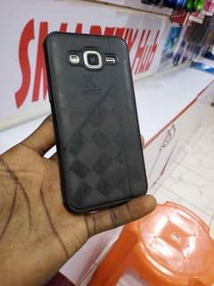 A picture of Samsung Galaxy j2 with some cracks but works well