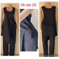 A picture of Jumpsuits available at 50k 70k. Whatsapp or call 0706620111. Ntinda.