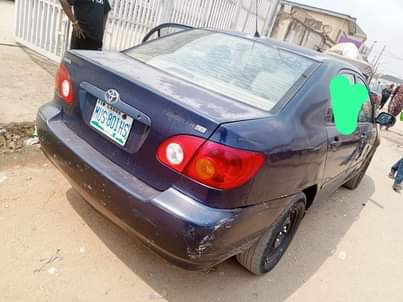 A picture of Toyota Corolla LE Tok standard first body year 2004 nothing