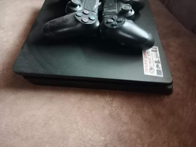 A picture of PS4 slim controllers