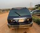 A picture of Super clean Lexus RX300 Engine Gear and AC is Good