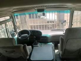 A picture of Toyota coaster bus...3RZ engine...year 2015...AC working perfectly... price 24m DM