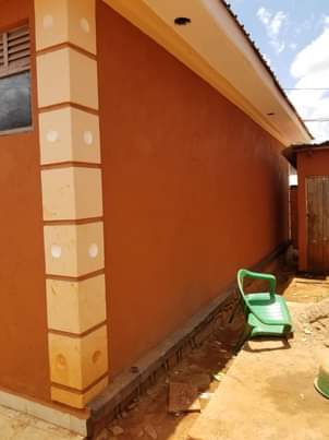 A picture of 7double rooms for sale at nansana kabulengwa seated on 60by