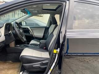 A picture of Sharp Foreign used 2014 upgraded to 2018 Toyota Rav4 in