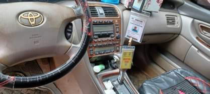 A picture of 2003 Toyota Avalon dashboard and everything is working perfectly well