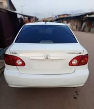 A picture of JUST IN Clean Nigerian Used White Toyota Corolla 2004 Baked