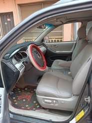 A picture of CLEANINESS PLUS GODLINESS IN A VEHICLE 3ROWS super clean and