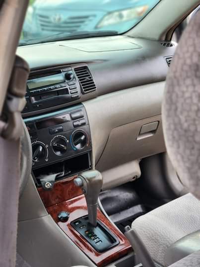 A picture of EXTREMELY SHARP PRE OWNED 2005 TOYOTA COROLLA LE CLEAN INTERIOR