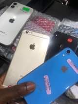 A picture of phones pc original iwatch and airpod power bank