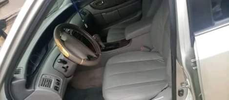 A picture of Sharp buy and drive Toyota Avalon dashboard with nothing to