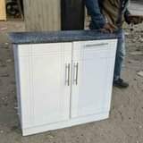 A picture of MEZA ZA JIKONI KITCHEN CABINETS ZINAPATIKANA 0764011987 Free delivery ndani