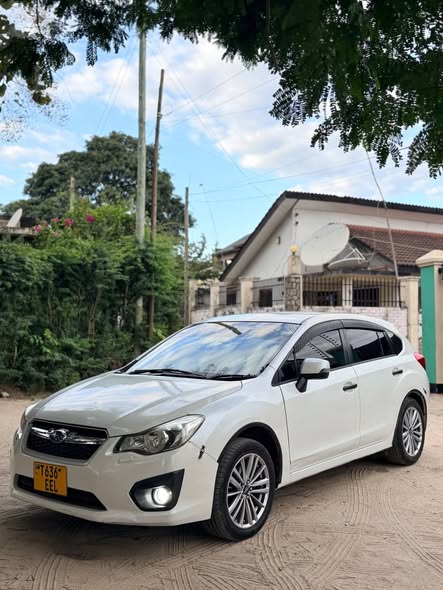 A picture of SUBARU IMPREZA NEW PRICE 13 900 000 TSHS CONTACT 0769265727