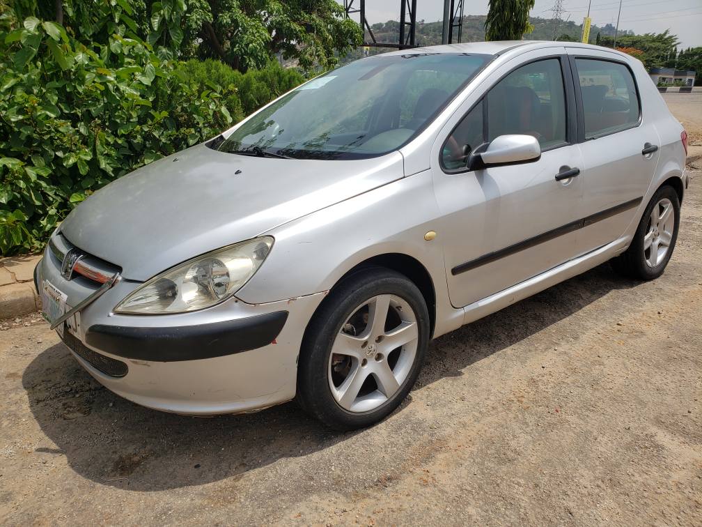 A picture of Peugeot manual transmission engine and gearbox untampered location Gwarinpa Abuja