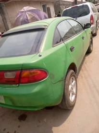 A picture of Mazda 323f 2005 model first body pan pan tokunbo standard