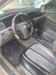 A picture of The name of this Corolla is Buy and Drive In