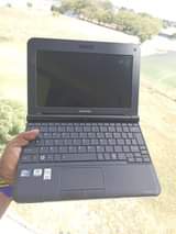 A picture of Nauza laptop Toshiba min intel Ram 2gb hdd 250gb procesor