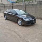 A picture of Honda civic 08 black color Everything is working perfectly buy