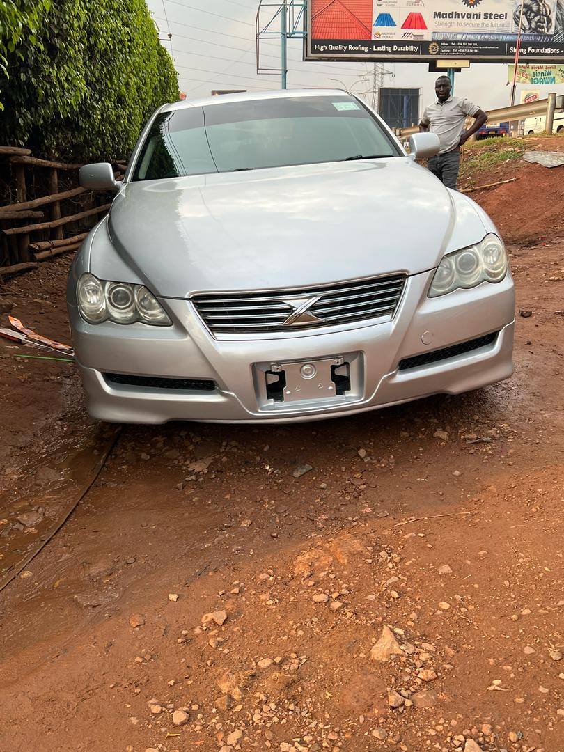 A picture of Toyota mark x and subaru gc8