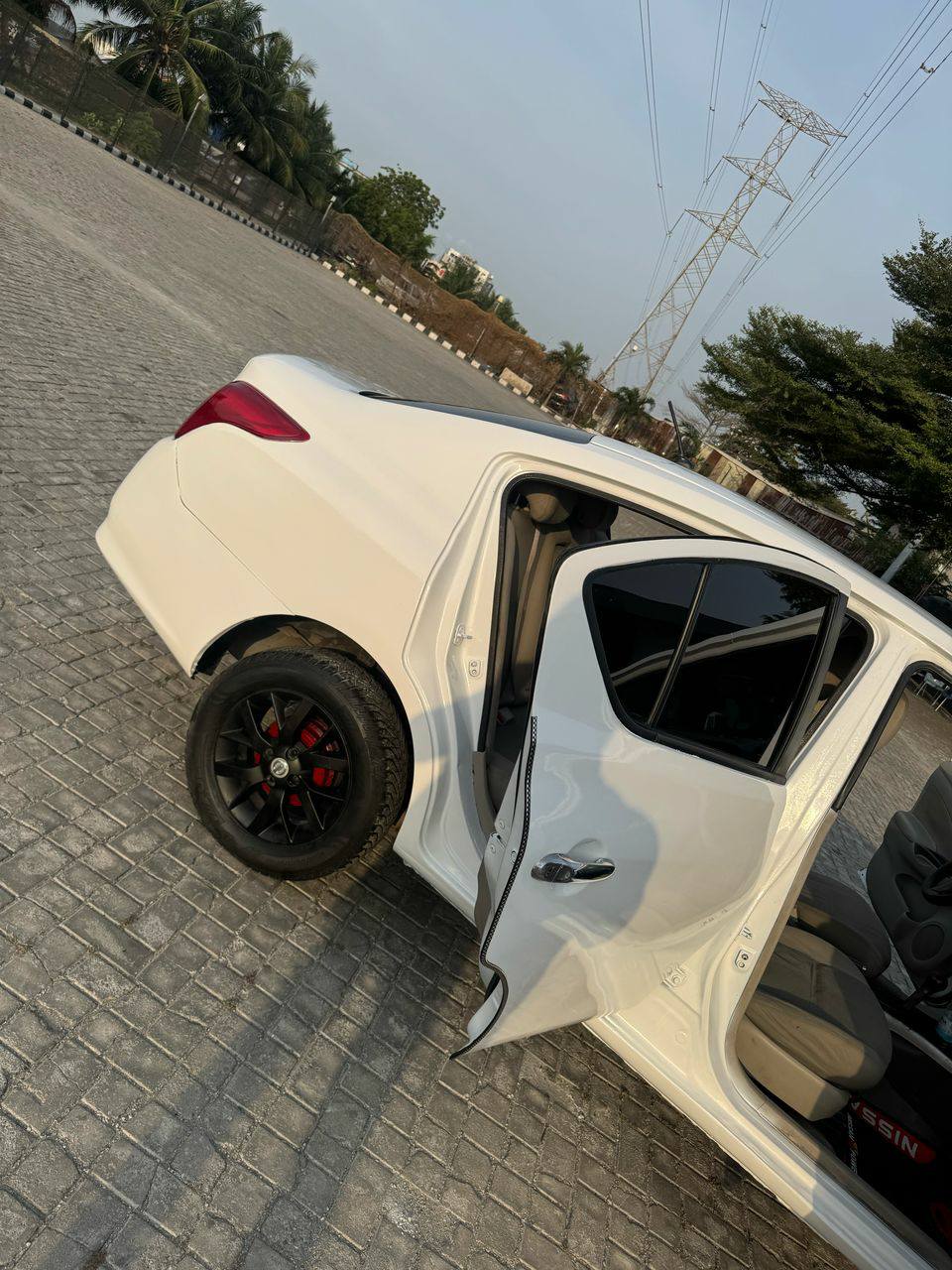 A picture of Nissan Almera 4 sale. Sweet car. 2014 model. 3.5m100k location