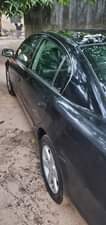 A picture of Nissan Altima very clean location ketu Lagos state don t