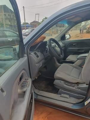 A picture of Clean Nigerian Used Silver Honda Pilot 2007 Neatly Repainted on
