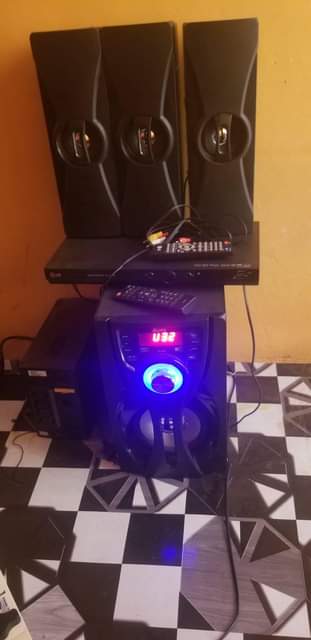 A picture of Allipu Bluetooth Woofer and LG DVD