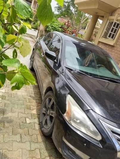 A picture of 2014 Altima toks standard 2 8m Settlement 150k rush now