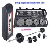 A picture of 50kg adjustable dumbbells and barbell chrome sets
