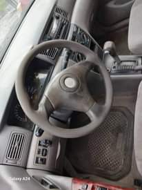 A picture of Toyota Corolla 2004 model body needs repackaging ac Is working