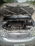 A picture of 2004 Toyota Corolla LE Super Sharp Engine with working AC