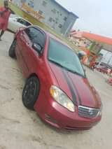 A picture of 2004 Toyota Corolla LE Very clean in and out Engine