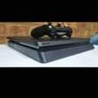 A picture of Playstation 4 slim full package ina kila kitu chake ni