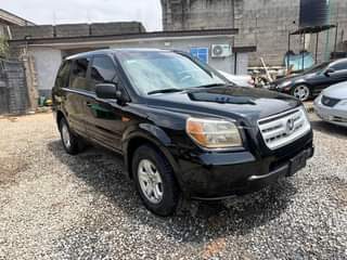 A picture of Brand Honda Model Pilot Year 2006 AC chilling