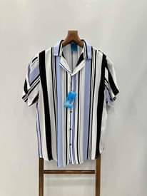 A picture of Bulamu vintage shirts Sizes available Call whatsapp 0759636169