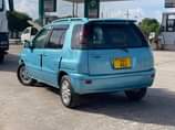 A picture of 1999 Toyota Raum Light blue